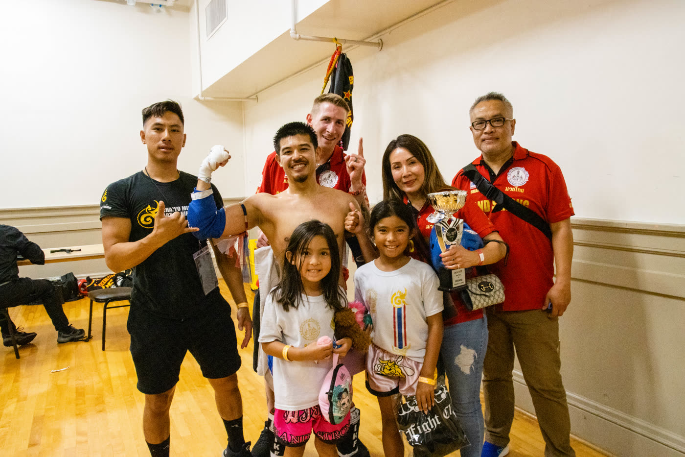 Family and coaches after the fights